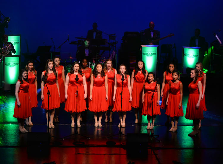 Show choir in red dresses