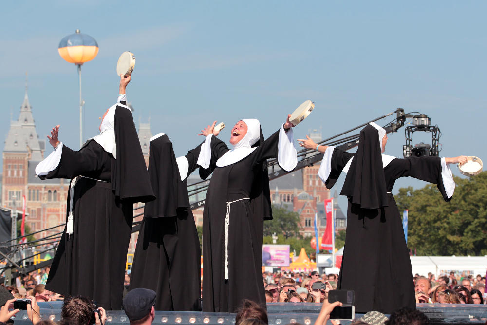 Four women dressed as nuns singing in a musical